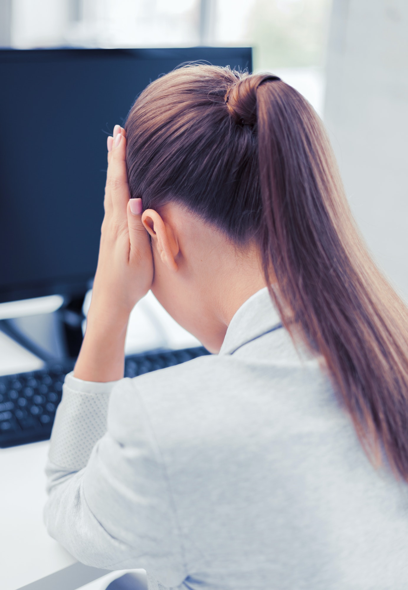 stressed woman with computer